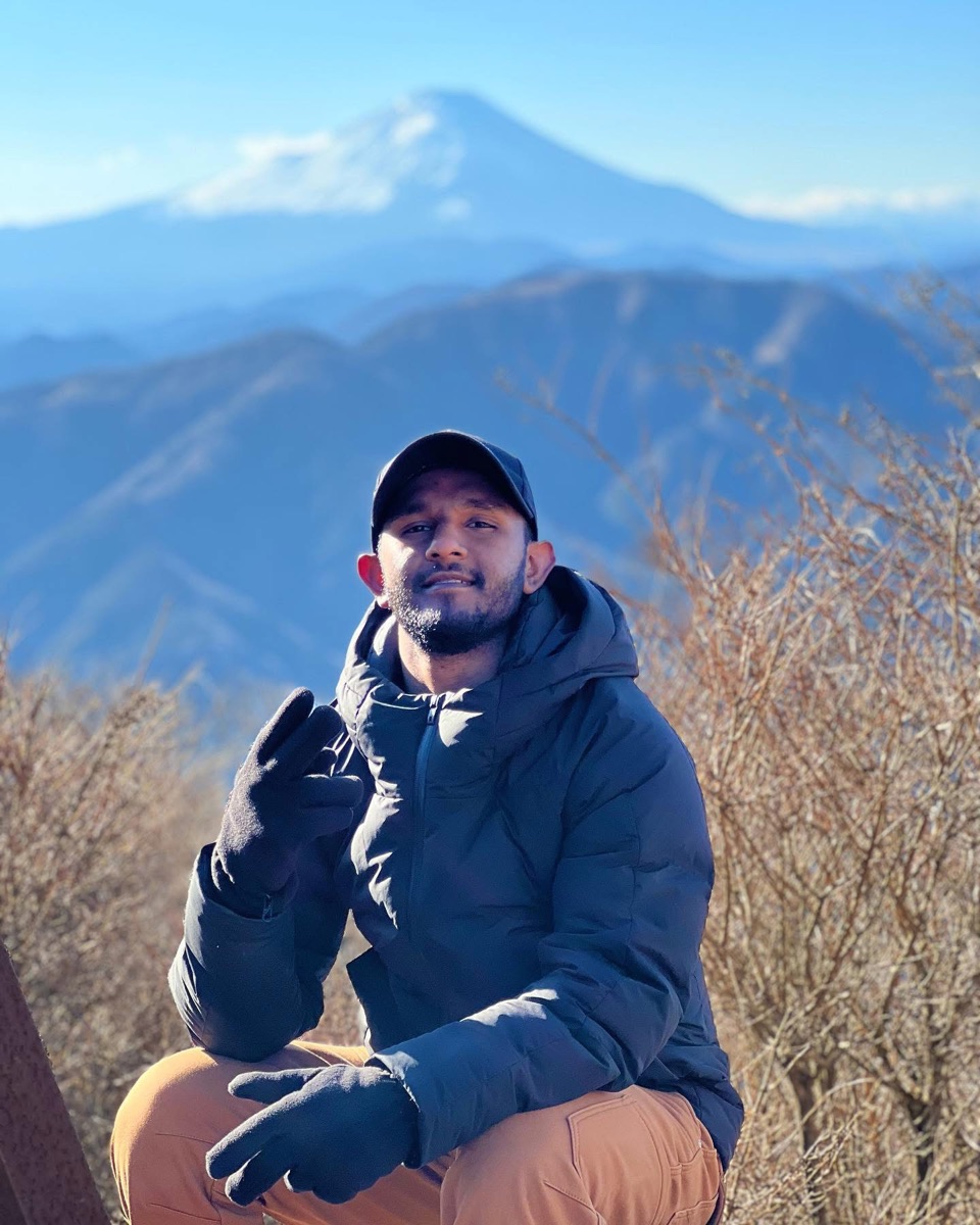 Inthikaf Ahamed, founder of Celvyr, with Mount Fuji behind him